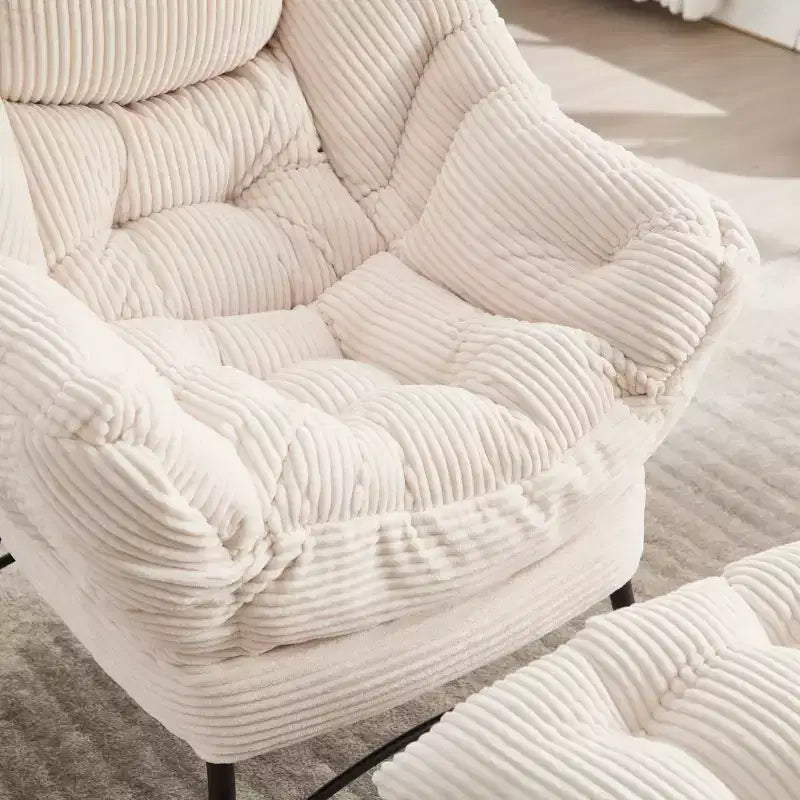 Fauteuil de salon moderne Zeus et Ruta rembourré avec accoudoirs, poche latérale et pouf assorti